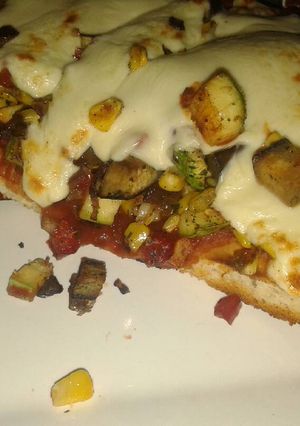 Una foto de Pizza vegetariana
