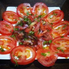 A picture of Tomato salad dhaba style.