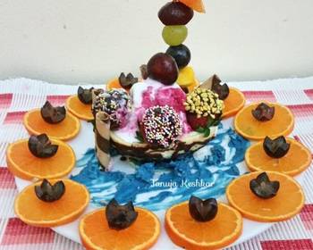 Popular Recipe Chocolate boat with mixed fruit ice cream and chocolate dry fruits balls Savory Delicious