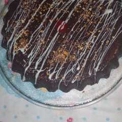 Una foto de Tarta Alfajor a mi estilo