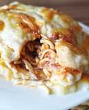 Crepes gratinados rellenos de gulas y champiñones