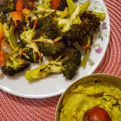 Cheesy roast broccoli with spicy avocado A picture of Cheesy roast broccoli with spicy avocado.