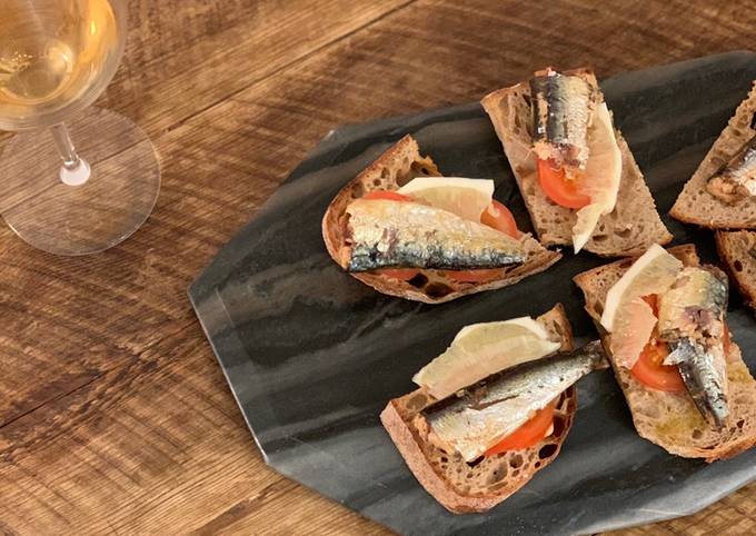 Sardine, butter, lemon, tomato & pepper on toast