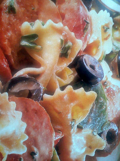 A picture of Italian Pasta Salad with A Tomato Dressing.