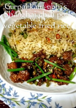 A picture of Shanghai chilli pork with vegetable fried rice 🐖🍚.