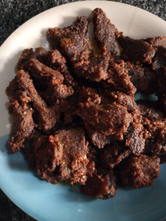 A picture of Baked beef with frying pan.