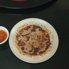 A picture of Aloo and cabbage paratha.