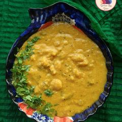 A picture of Rasiya Muthiya (Rice Dumplings in gravy).