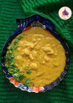 A picture of Rasiya Muthiya (Rice Dumplings in gravy).