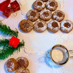 “Peanut-Butter Thumb Print wheat cookies “ A picture of “Peanut-Butter Thumb Print wheat cookies “.