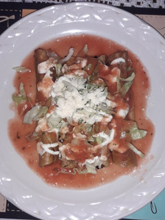 Una foto de Tacos dorados de pierna, con tortillas de un día antes