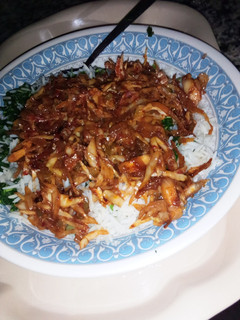 A picture of Basmati rice with cabbage sauce.