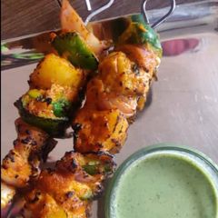 Grilled Masala paneer tikka with hung curd A picture of Grilled Masala paneer tikka with hung curd.