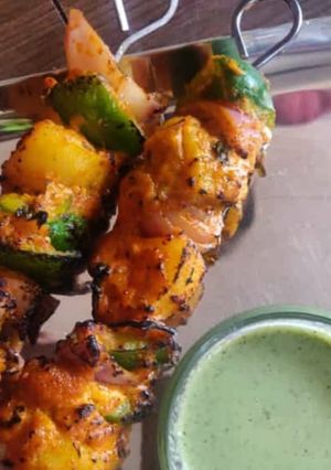 A picture of Grilled Masala paneer tikka with hung curd.