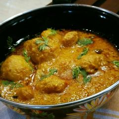 A picture of Dum aloo in coconut milk.