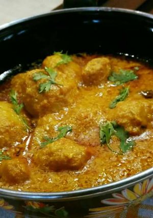 A picture of Dum aloo in coconut milk.