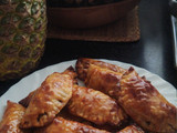 Empanadillas de berenjena, atún, cebolla y tomate