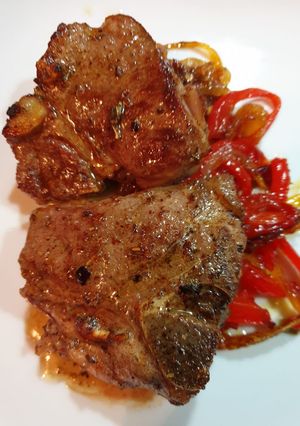 Foto di Costate di agnello con peperoni