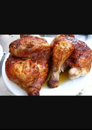 Una foto de Pollo al horno con ajos