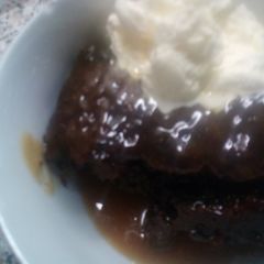 A picture of Sticky Toffee Pudding with Toffee Sauce.