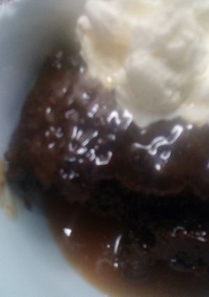 A picture of Sticky Toffee Pudding with Toffee Sauce.