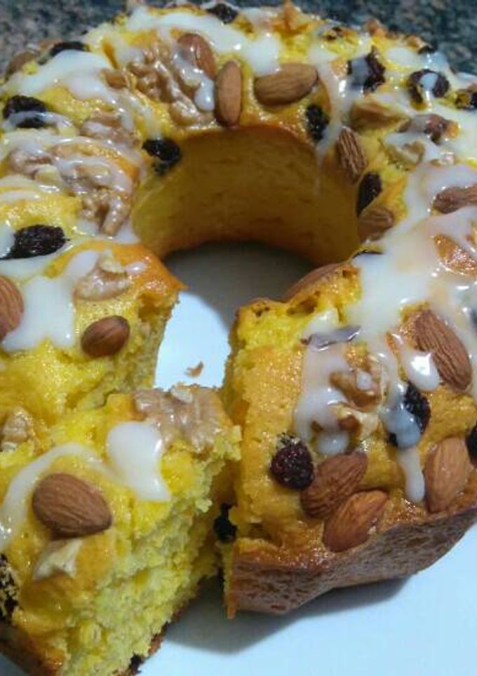 Una foto de Torta de mandarinas y frutas secas..🍊