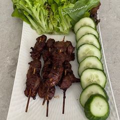 A picture of Grilled Chicken Gizzards with Herbs.
