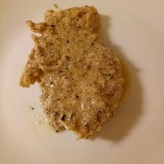 A picture of Pork loin with mushroom sauce.