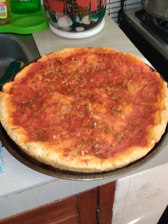 Una foto de Pizza con Royal