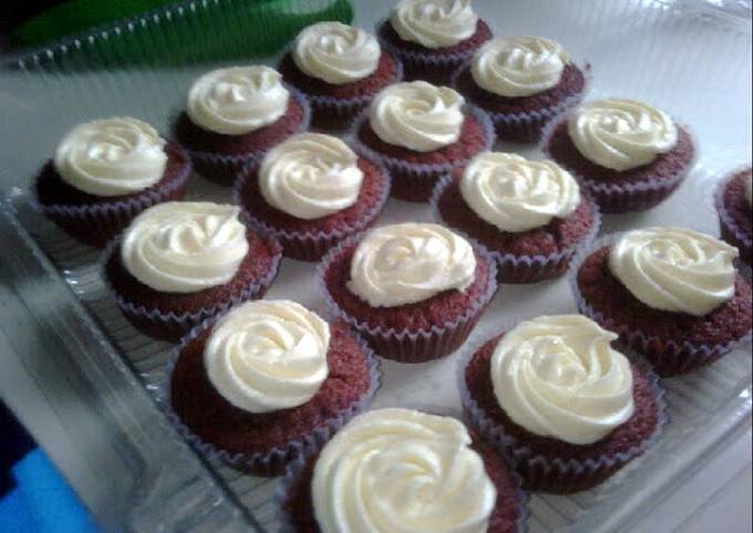 delicious red velvet cupcakes topped with creamy cream cheese