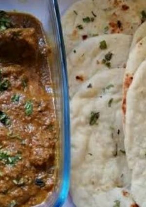 A picture of Kadhai Paneer with Stuffed naan.