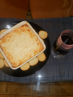 Una foto de Gratinado de queso y cebolla