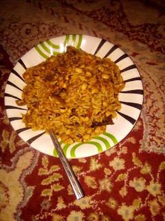 A picture of Jollof Rice 🍚 and Beans.