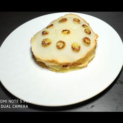 A picture of Coconut semolina pan cake.