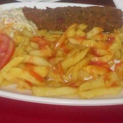 A picture of Potato fries with kebab.