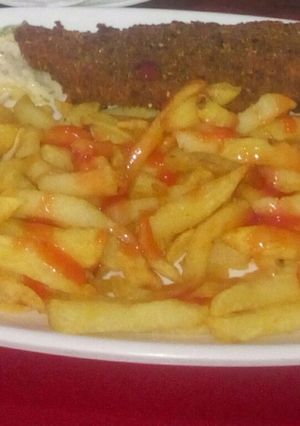 A picture of Potato fries with kebab.