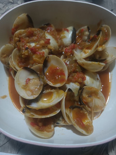 Una foto de Almejas en salsa