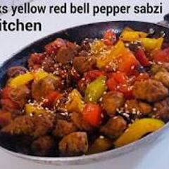 A picture of Soya Chunks Yellow Red Bell Pepper Sabzi.