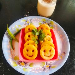 A picture of Smiley potato with corn flour (baby potato with corn flour (smiley potato snacks).