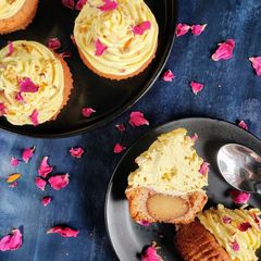 A picture of Gulab Jamun Cupcakes with thandai frosting.
