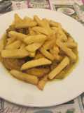 Pollo al limón con patatas fritas