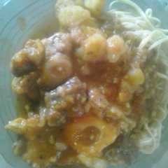 Una foto de Estofado de rabo y ossobuco con papa y batata