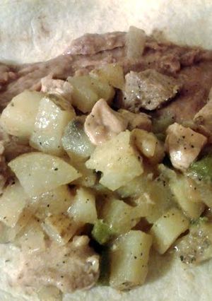 A picture of smotherd burrito.