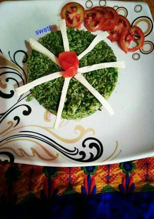 A picture of Palak matar paneer pulav.