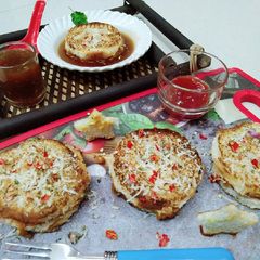 A picture of Pocket bread pav bhaji pizza.