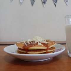 A picture of Buttermilk Pancake with Caramel and Cheese Topping.