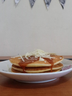 A picture of Buttermilk Pancake with Caramel and Cheese Topping.