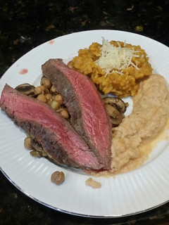 A picture of Brad's flank steak w/ pumpkin risotto & smoky cauliflower mash.