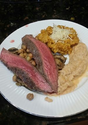 A picture of Brad's flank steak w/ pumpkin risotto & smoky cauliflower mash.