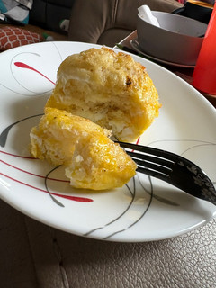 A picture of Pancake and egg breakfast sandwich.